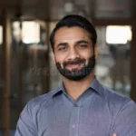 portrait-young-happy-indian-business-man-executive-looking-camera-portrait-young-happy-indian-business-man-executive-214230764